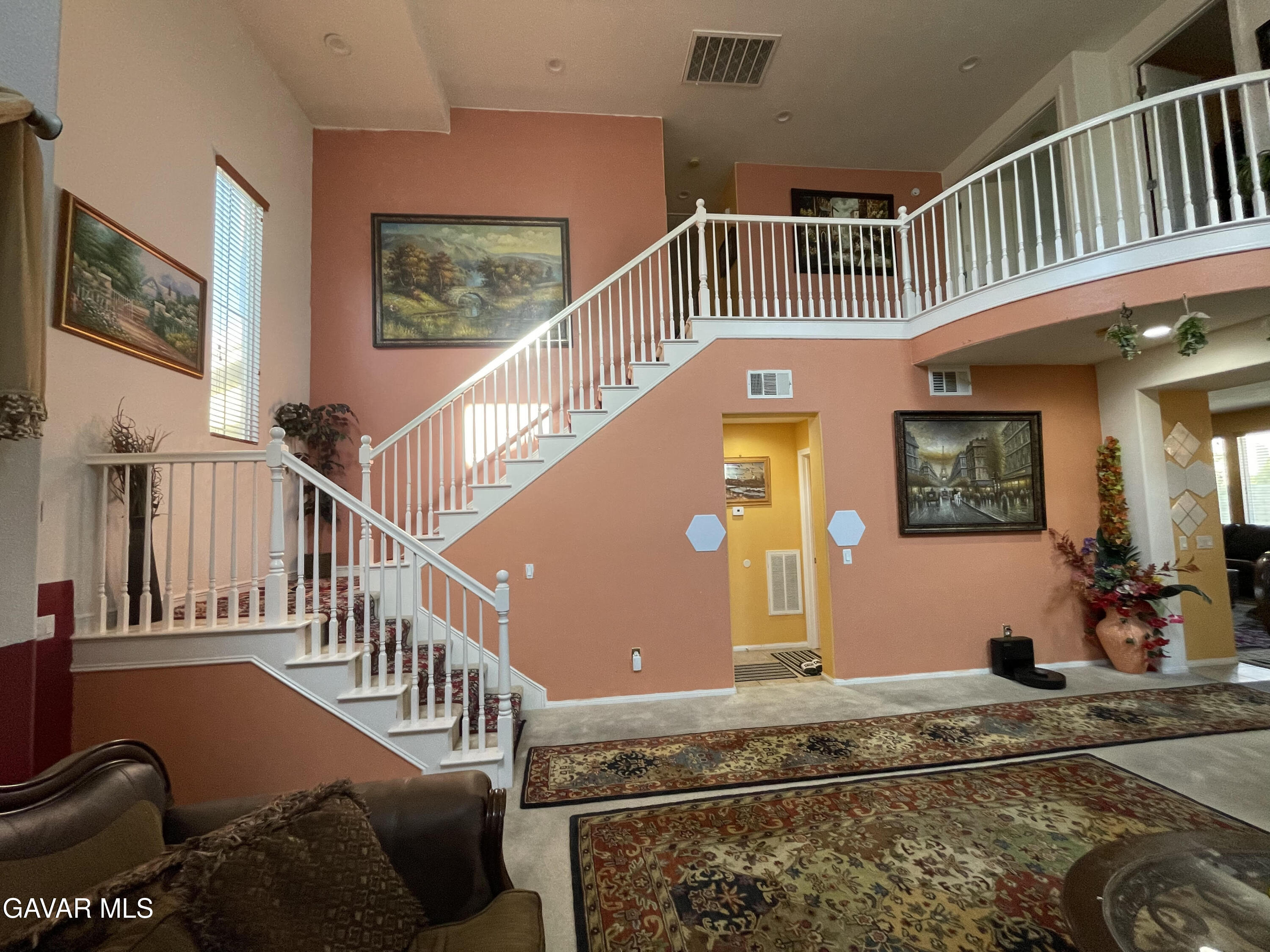 3303 Arious Way Lancaster, CA 93536 - Photo 7 of 43 a front view of a house with entryway and stairs