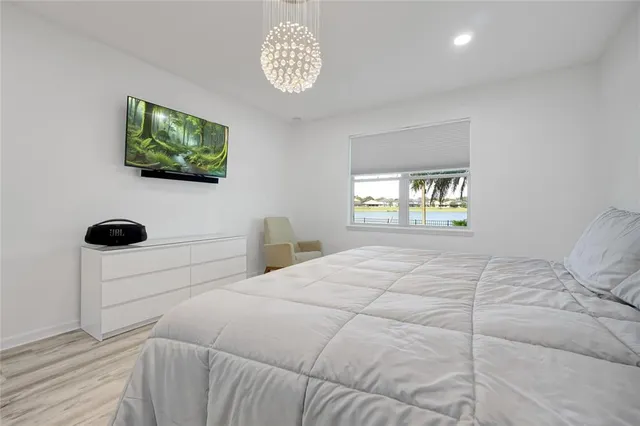 a storage room with furniture and a wooden floor