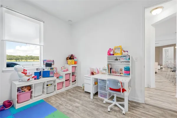 a bathroom with 2 sink tub and a mirror