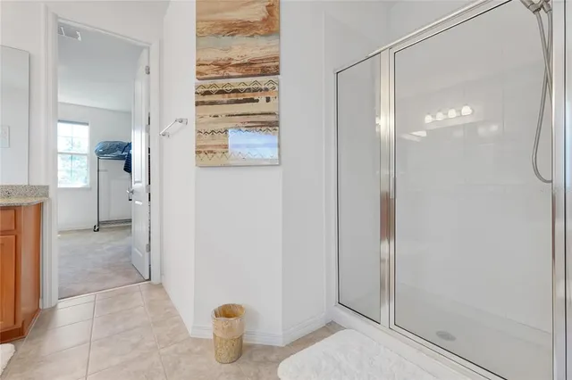 a view of swimming pool with a yard and plants