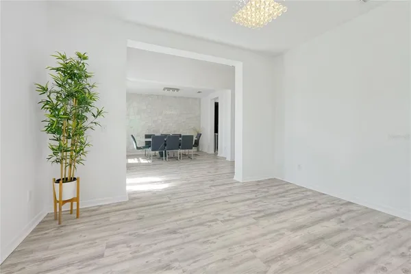 a view of livingroom with furniture and wooden floor