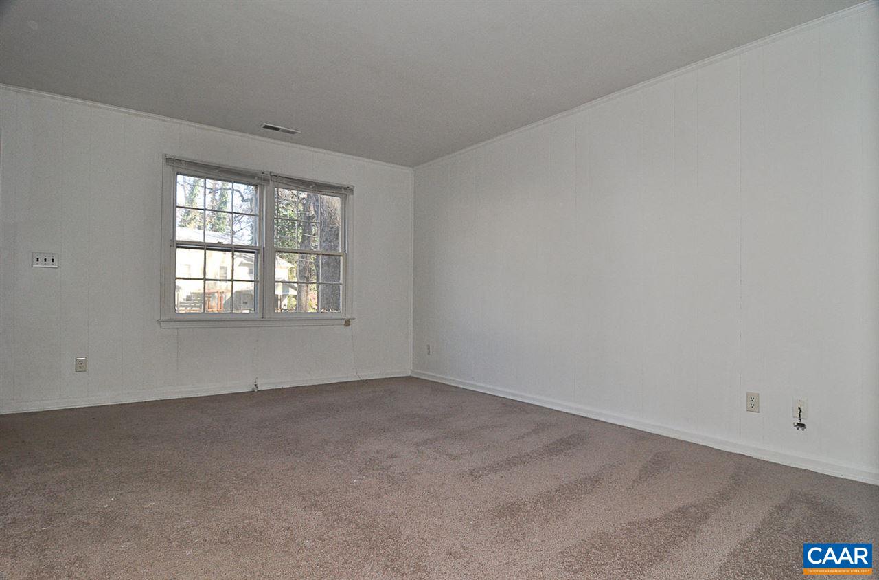 319 Valley Rd Extension, Unit 319 Charlottesville, VA 22903 - Photo 4 of 15 an empty room with a window