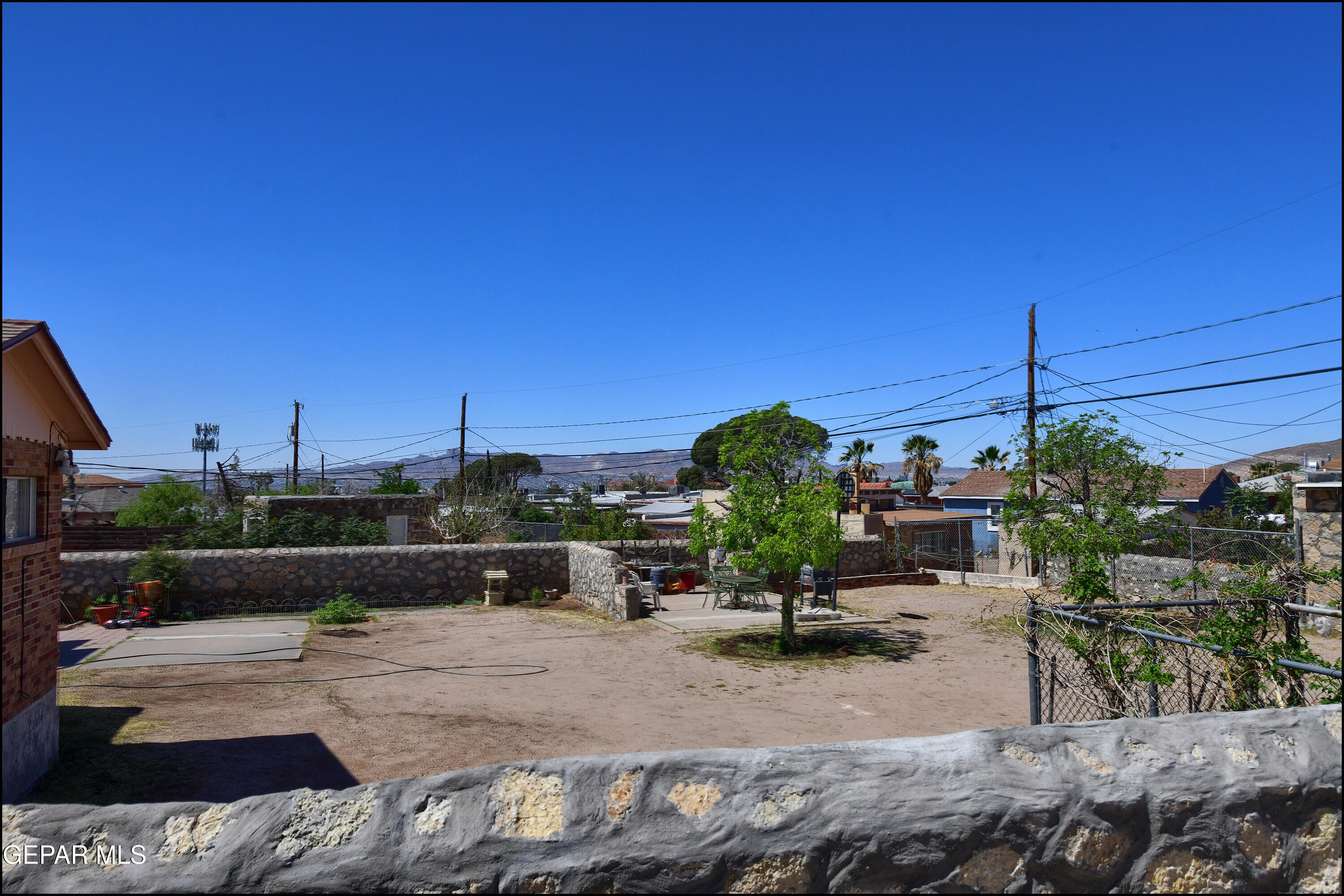 5107 Raymond Jays Road El Paso, TX 79903 - Photo 32 of 35 a view of a terrace with sitting area
