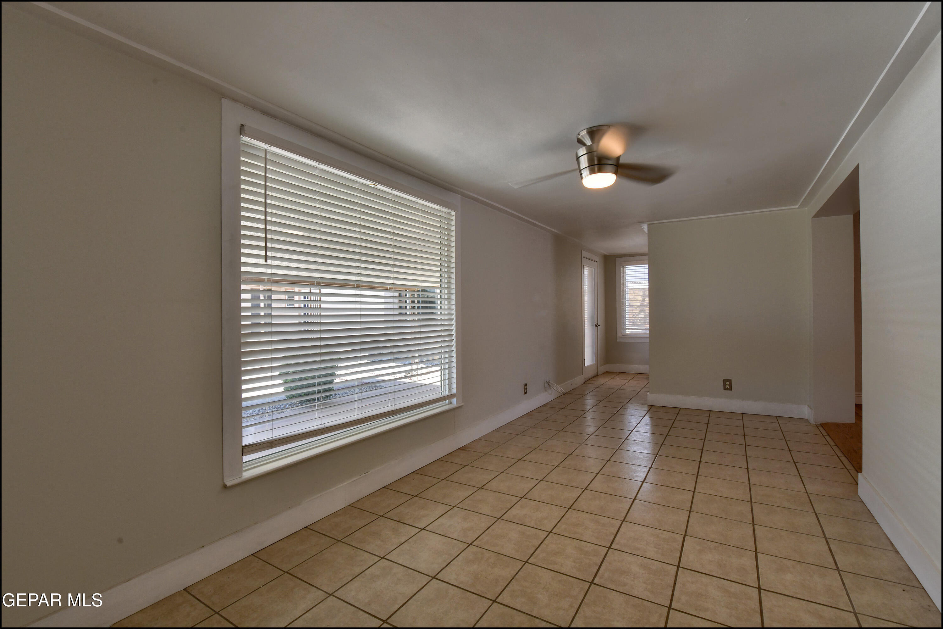 5107 Raymond Jays Road El Paso, TX 79903 - Photo 10 of 35 a view of an empty room with a window