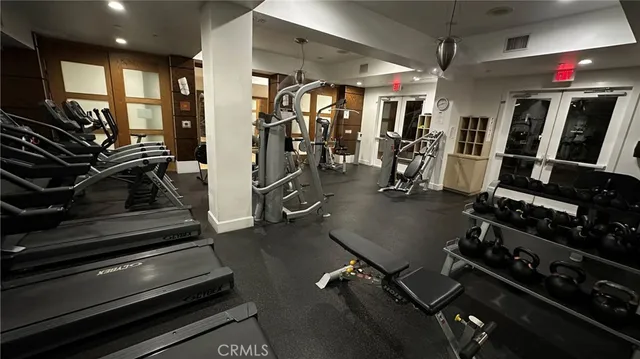 a gym room with gym equipment