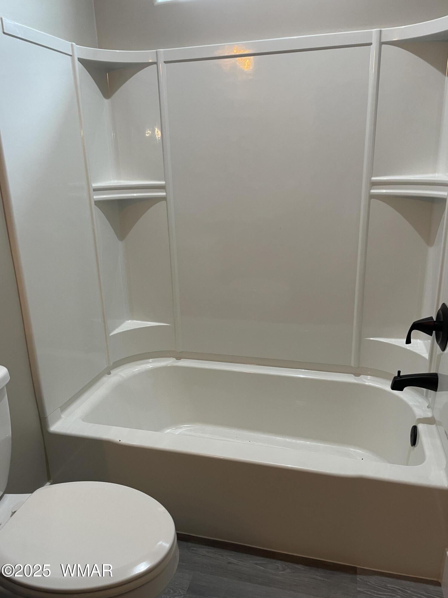 2426 Aspen Run Pinetop, AZ 85935 - Photo 18 of 44 a bathroom with a bathtub and a shower