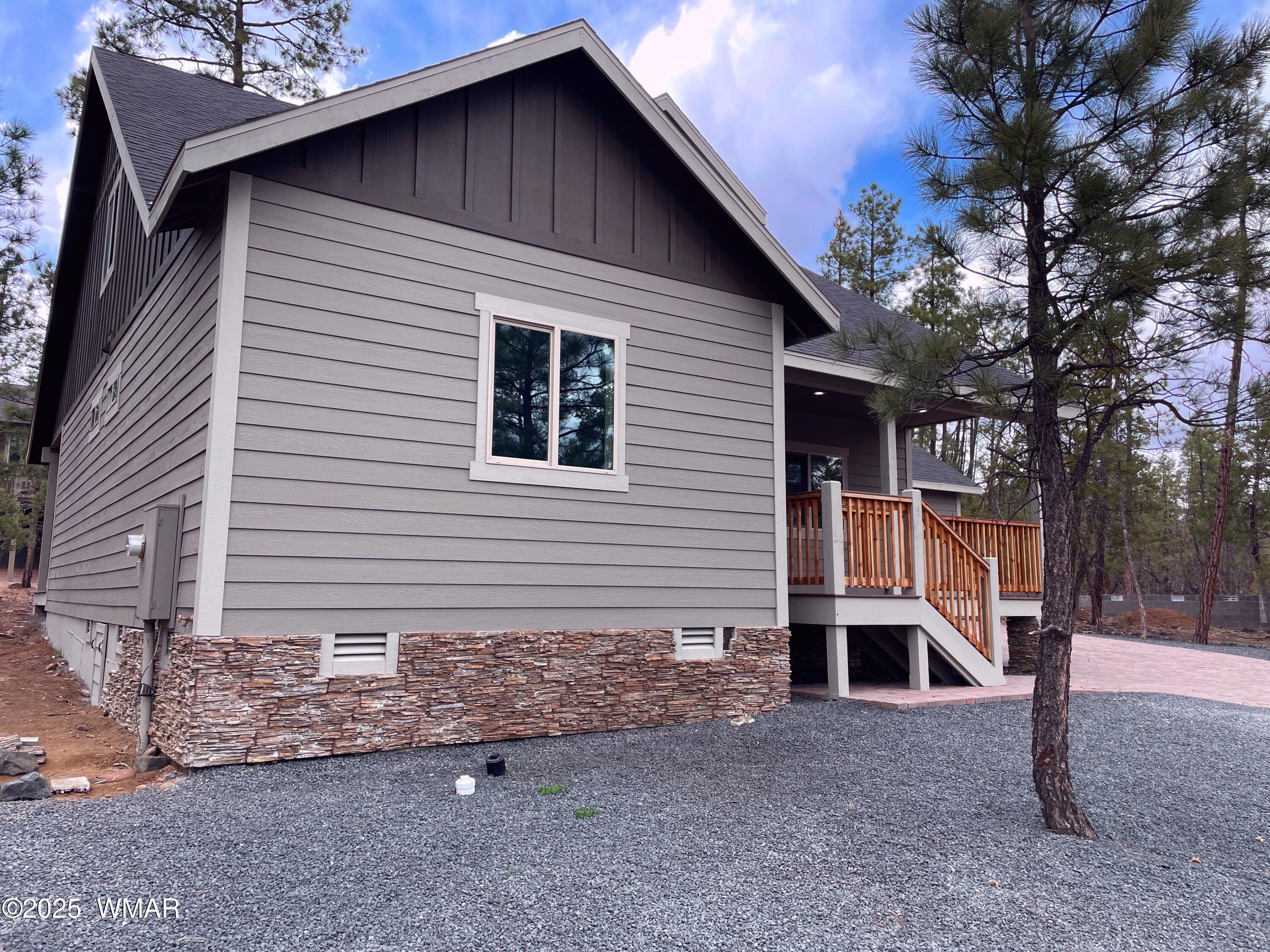 2426 Aspen Run Pinetop, AZ 85935 - Photo 2 of 44 a view of a house with a yard