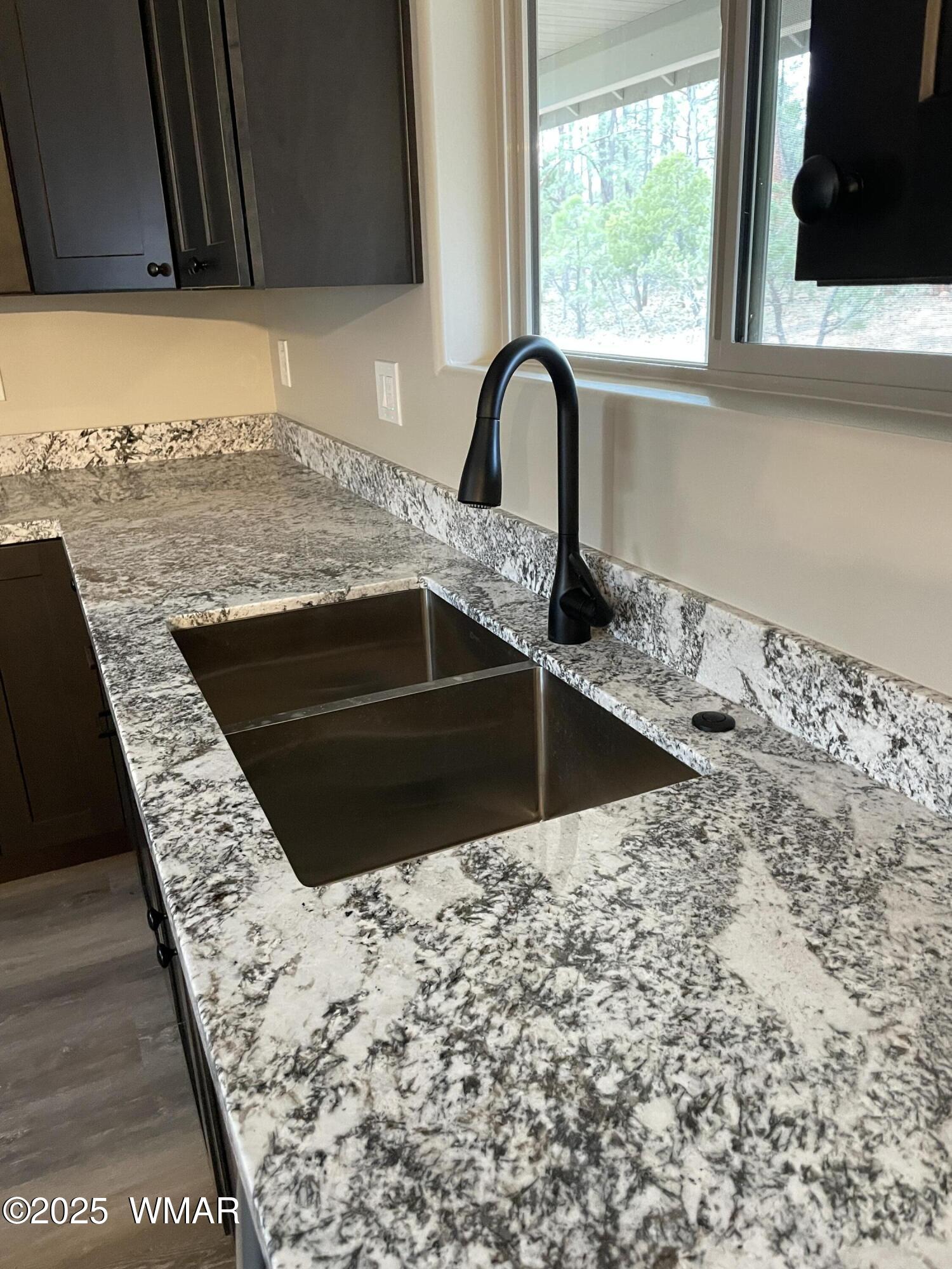 2426 Aspen Run Pinetop, AZ 85935 - Photo 6 of 44 a bathroom with a sink and a mirror