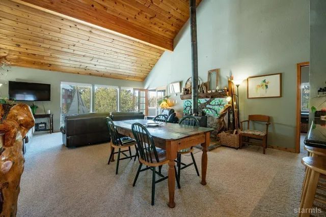 a view of a livingroom with furniture and window