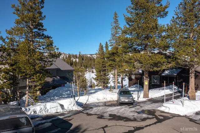 a view of a building with sitting area