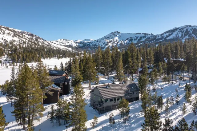 a view of a houses with a yard