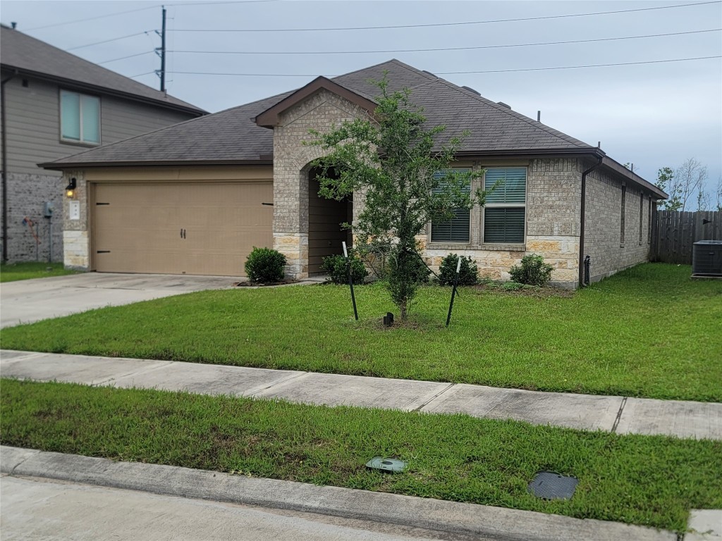 846 Autumn Flats Way Rosharon, TX 77583 - Photo 2 of 26 a view of a house with a backyard