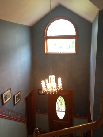 26001 Mary Road Garden Prairie, IL 61038 - Photo 11 of 19 a view of a livingroom with a chandelier