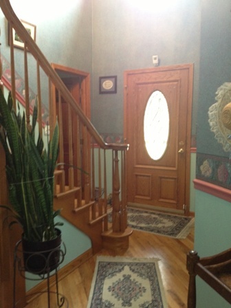 26001 Mary Road Garden Prairie, IL 61038 - Photo 3 of 19 a view of a entryway with wooden floor