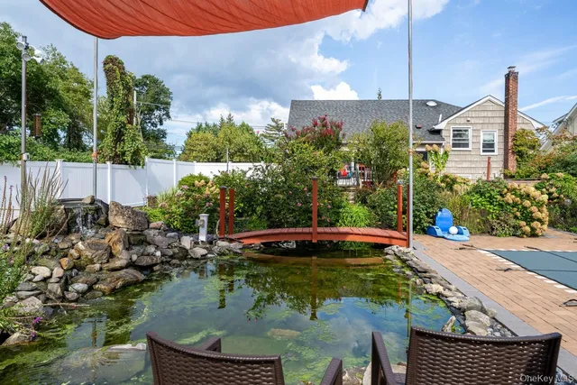 a view of a swimming pool with a patio