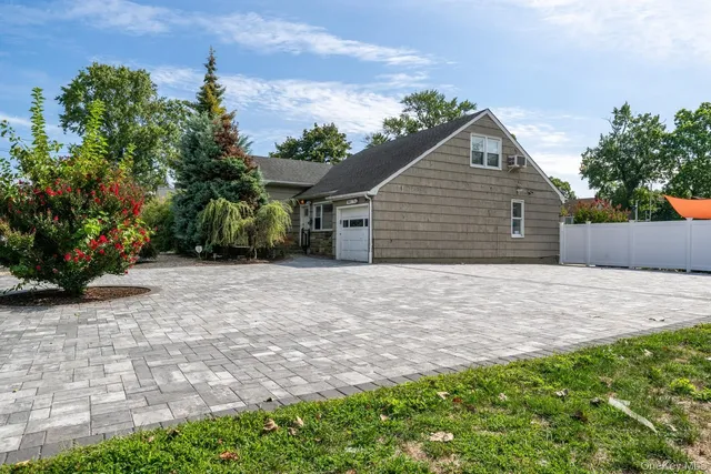 a view of a backyard of the house