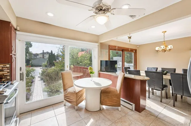 a view of a backyard with sitting area