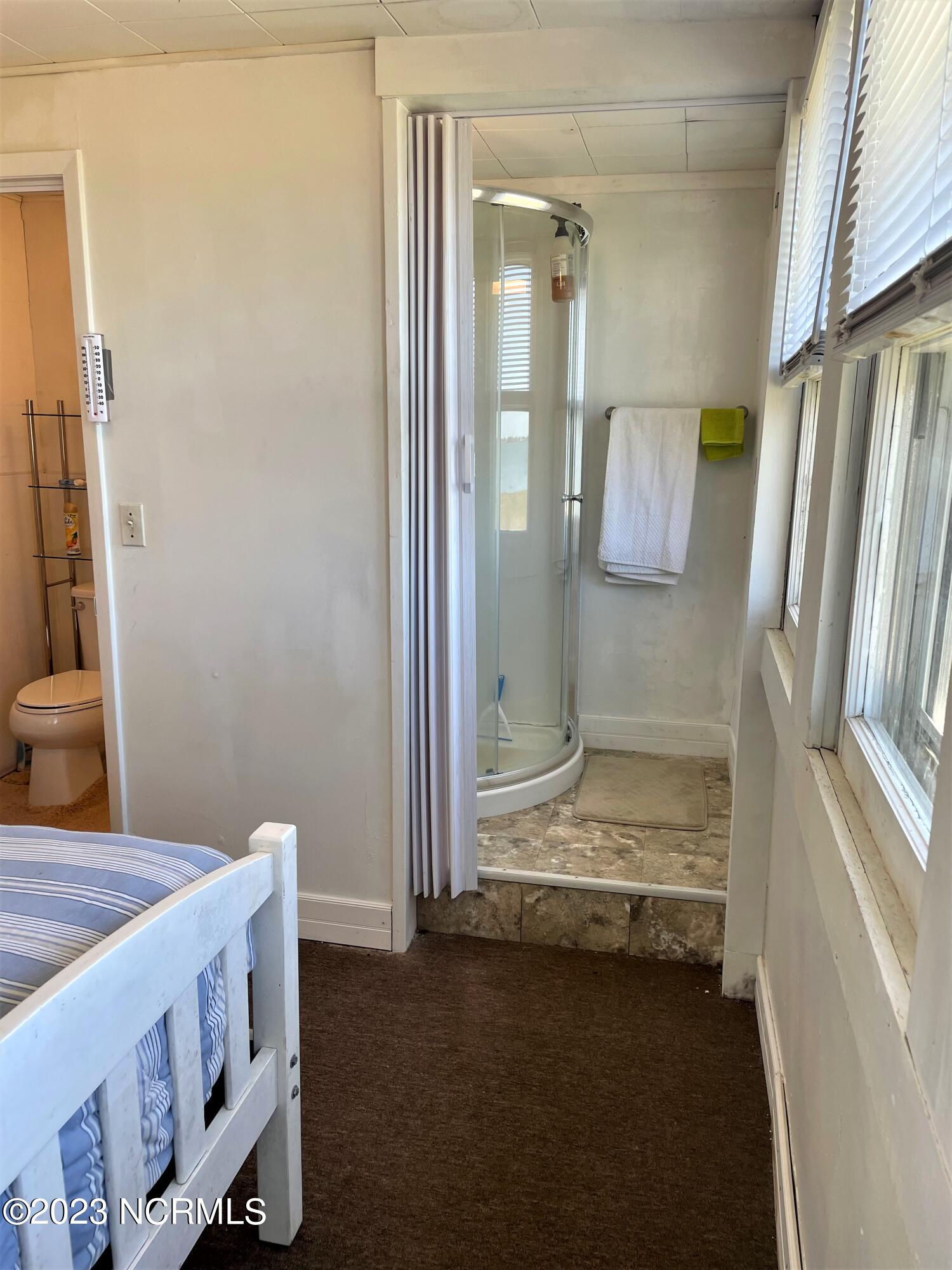 148 Down Home Road Gloucester, NC 28528 - Photo 37 of 66 Sunroom Shower