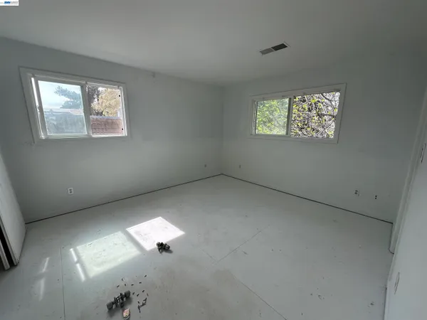 an empty room with a window