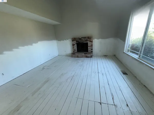 wooden floor in an empty room with wooden floor
