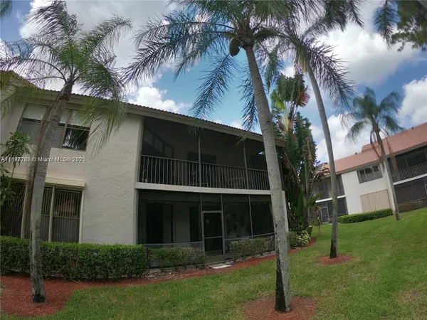 $480,000 | 5800 Coach House Circle, Unit E, Boca Raton, FL 33486