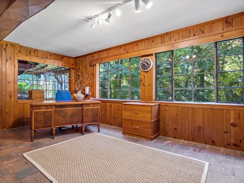 62 Arnold Road Wellesley, MA 02481 - Photo 16 of 24 a room with wooden floor and furniture