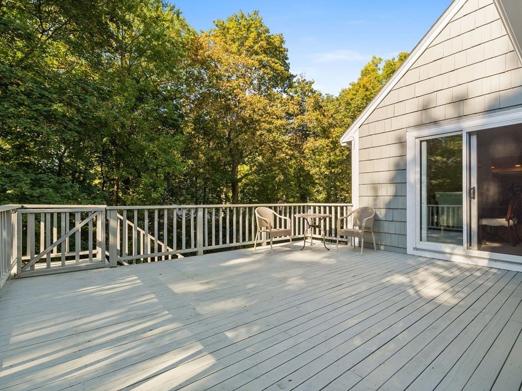 62 Arnold Road Wellesley, MA 02481 - Photo 20 of 24 a view of a wooden deck