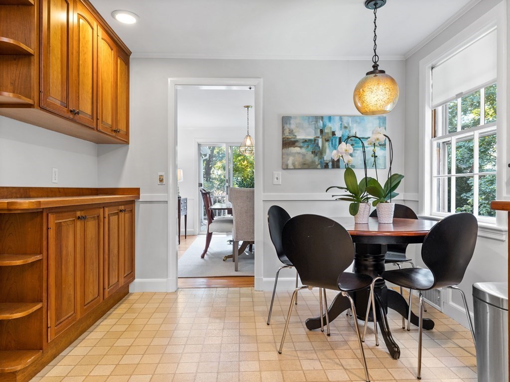 62 Arnold Road Wellesley, MA 02481 - Photo 5 of 24 a view of a dining room with furniture window and wooden floor
