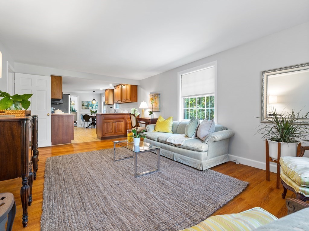 62 Arnold Road Wellesley, MA 02481 - Photo 8 of 24 a living room with furniture and a fireplace