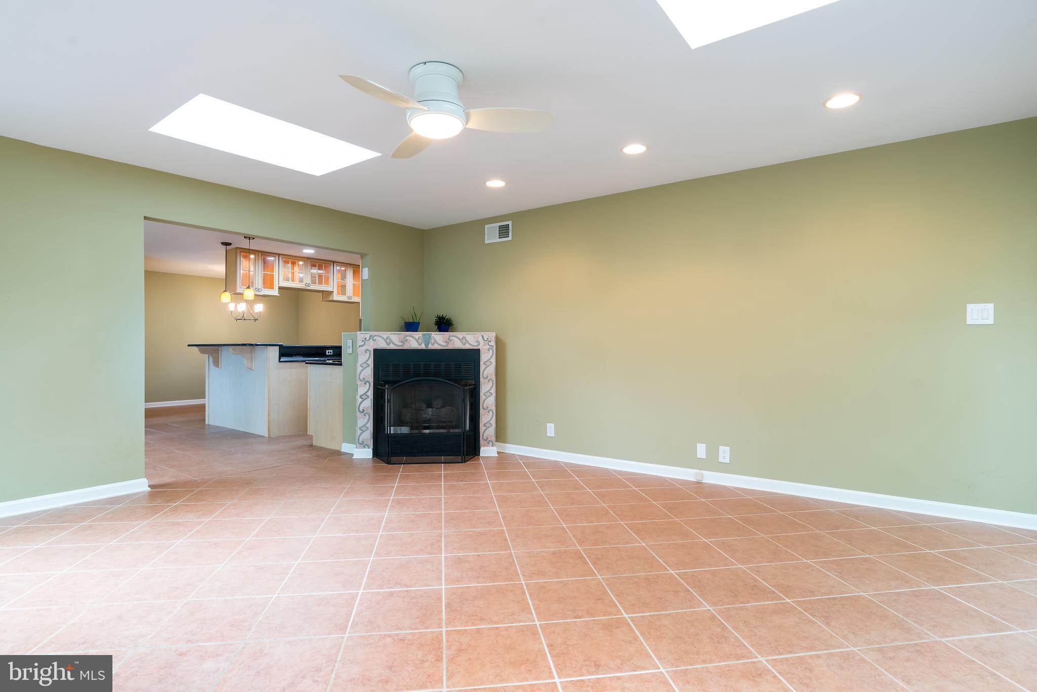 5941 Hall Street Springfield, VA 22152 - Photo 18 of 35 Enjoy the cozy corner fireplace in the sunroom!