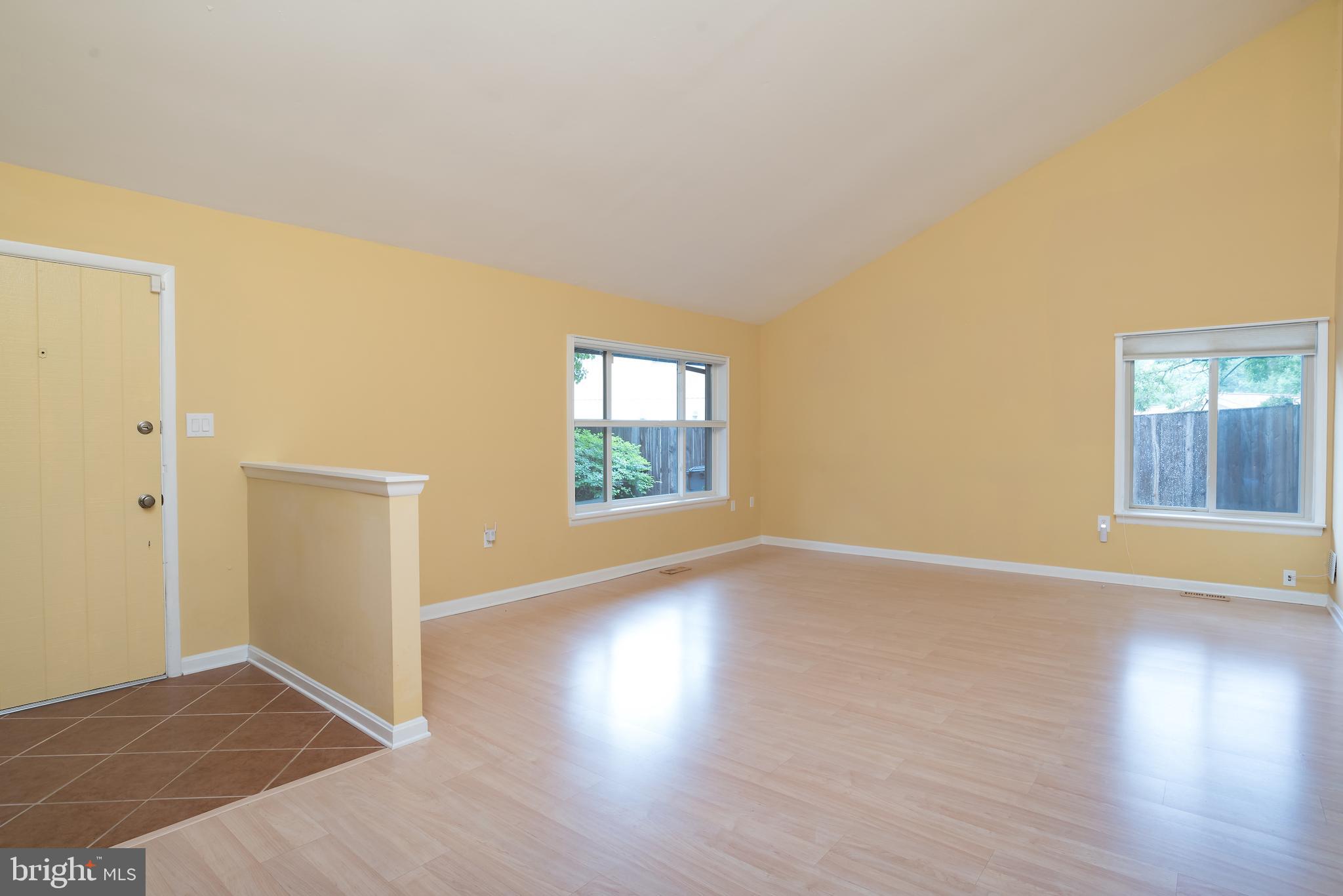 5941 Hall Street Springfield, VA 22152 - Photo 3 of 35 Living room boasts wood floor & vaulted ceiling