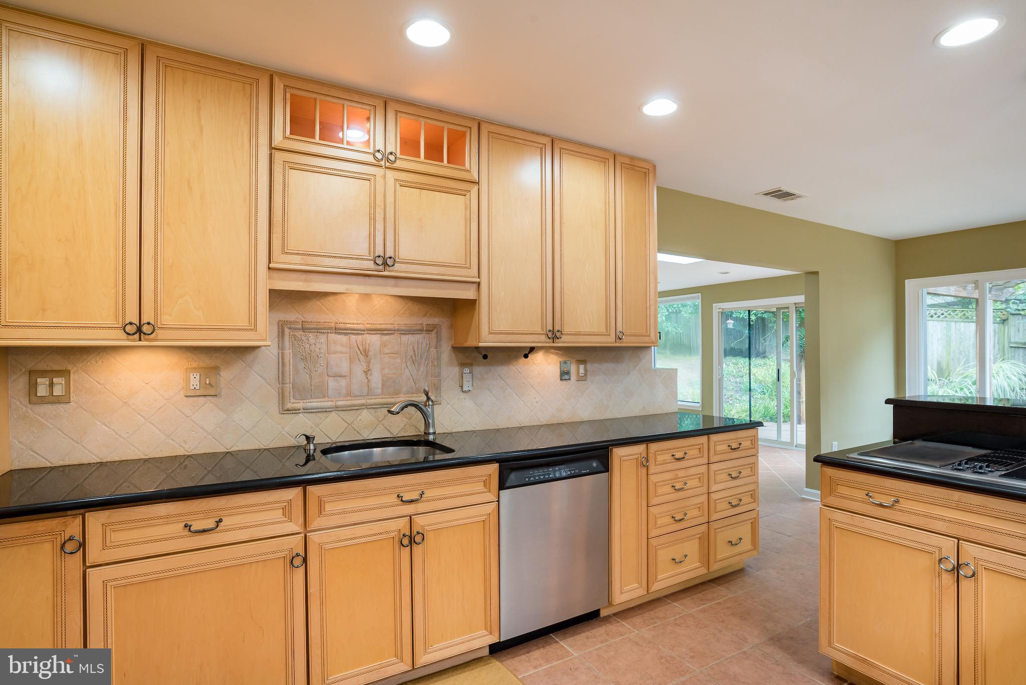 5941 Hall Street Springfield, VA 22152 - Photo 6 of 35 Kitchen with granite counters and SS appliances