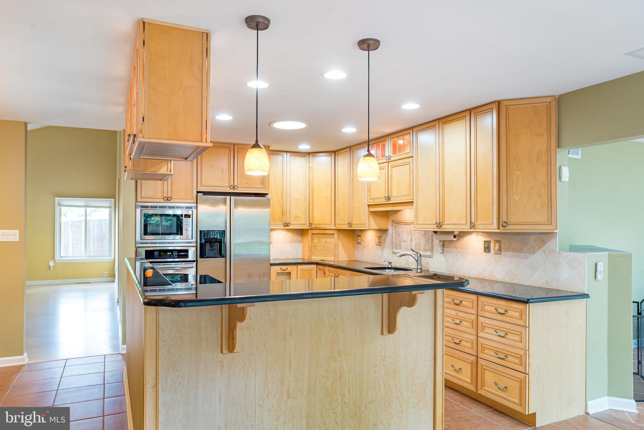 5941 Hall Street Springfield, VA 22152 - Photo 9 of 35 Open kitchen makes for easy entertaining!
