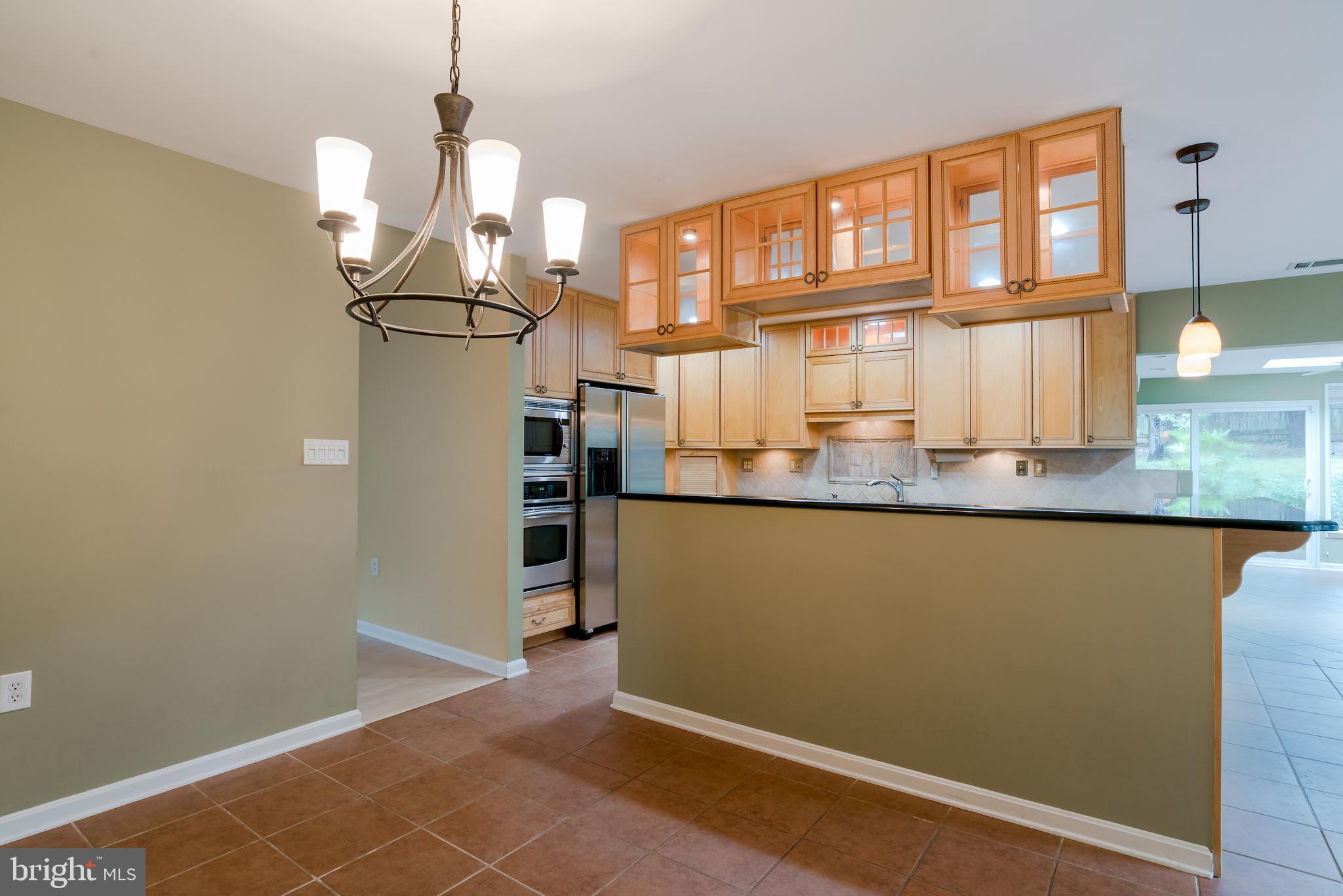 5941 Hall Street Springfield, VA 22152 - Photo 10 of 35 Kitchen opens to formal dining space