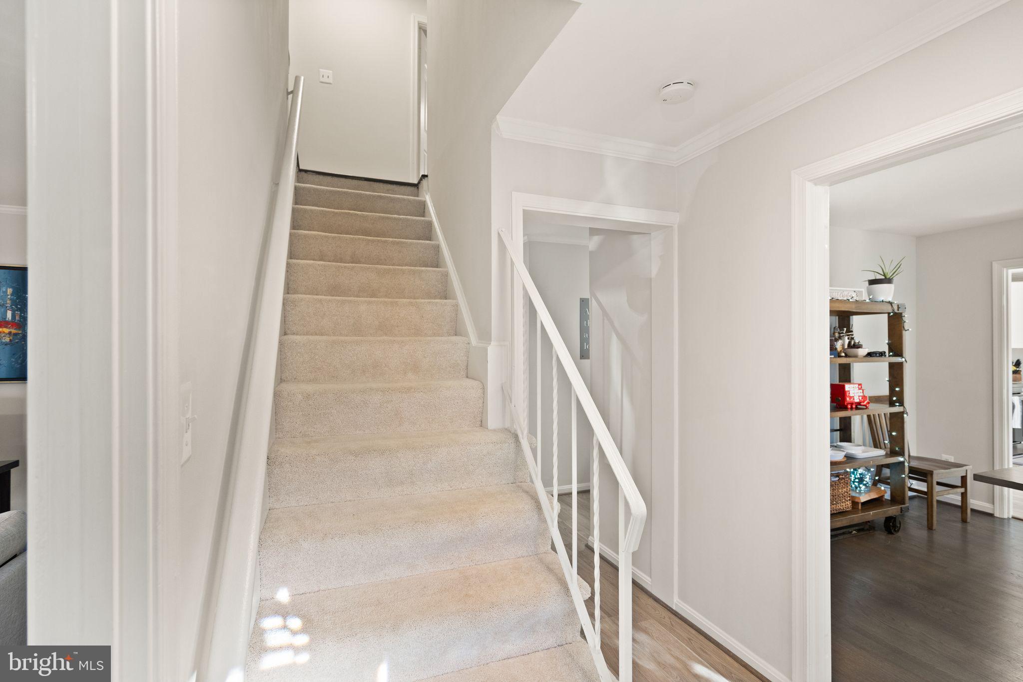 10808 Hunt Club Road Reston, VA 20190 - Photo 23 of 49 a view of entryway and hall with wooden floor