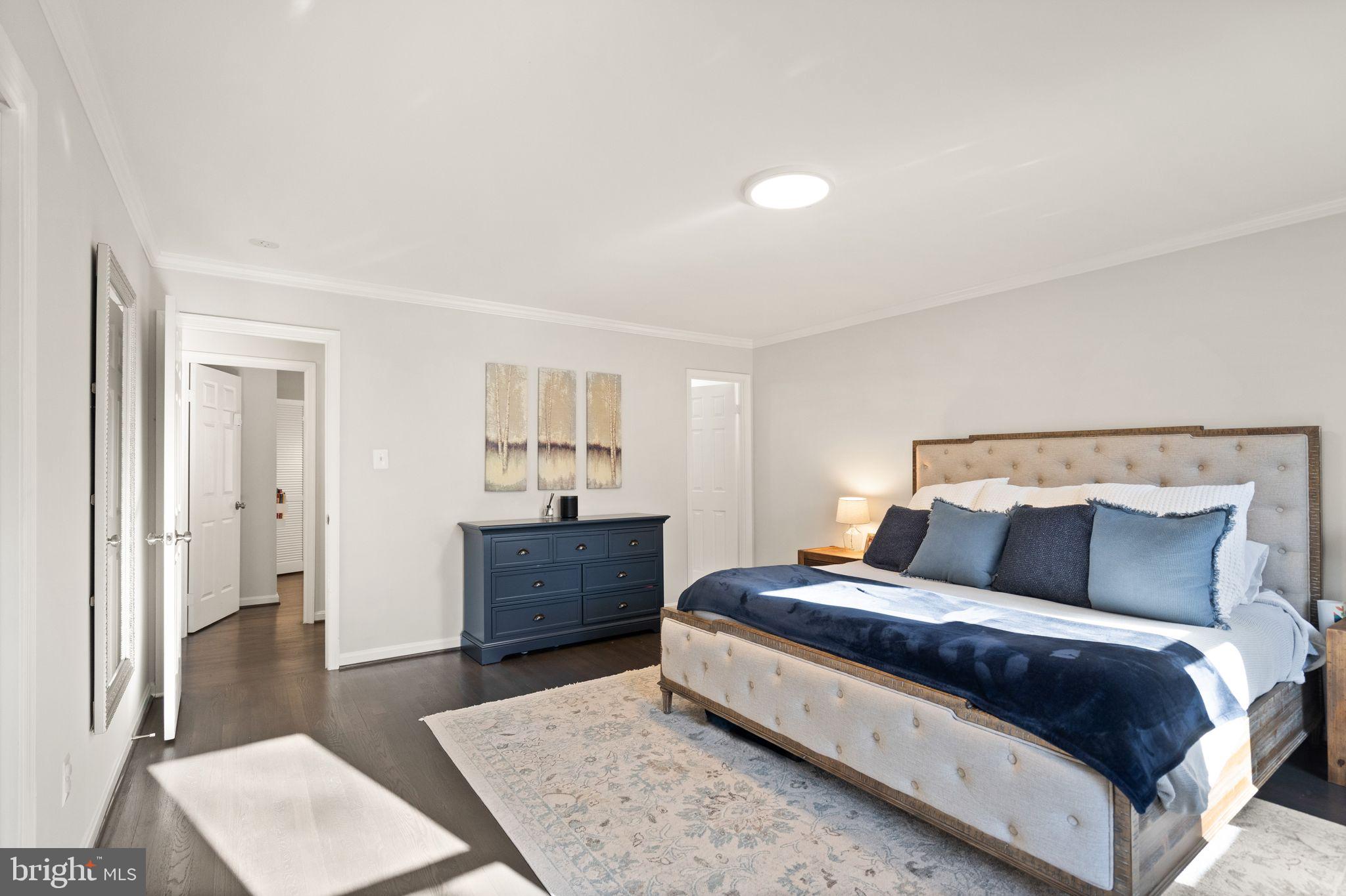10808 Hunt Club Road Reston, VA 20190 - Photo 24 of 49 a bedroom with bed and window
