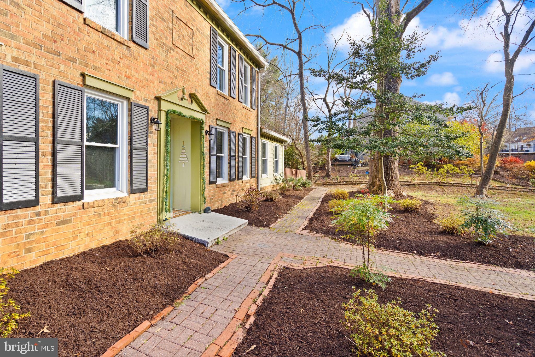 10808 Hunt Club Road Reston, VA 20190 - Photo 3 of 49 a house with yard in front of it