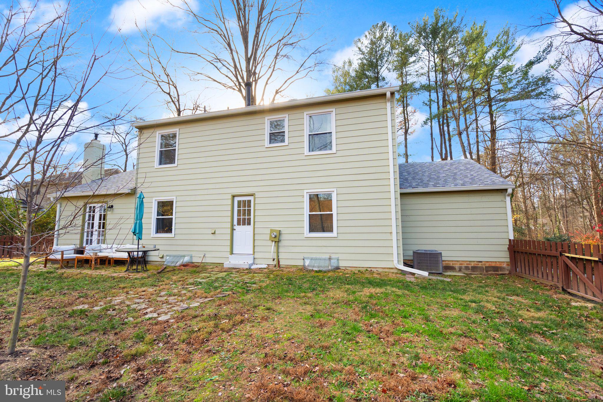 10808 Hunt Club Road Reston, VA 20190 - Photo 49 of 49 a front view of a house with a yard