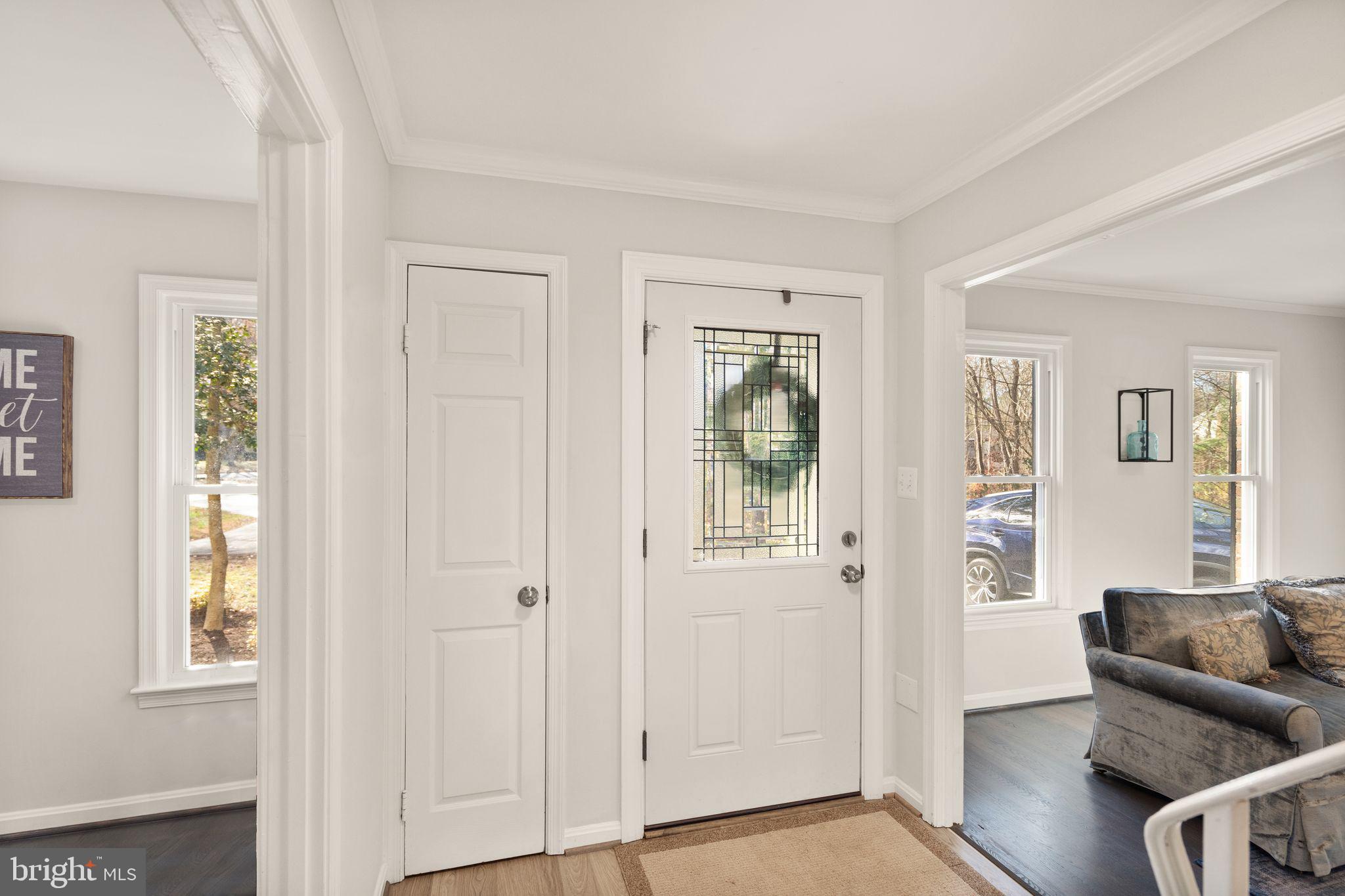 10808 Hunt Club Road Reston, VA 20190 - Photo 5 of 49 wooden floor and windows in a room with windows