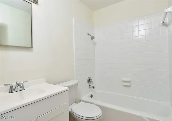 a bathroom with a sink toilet and bathtub