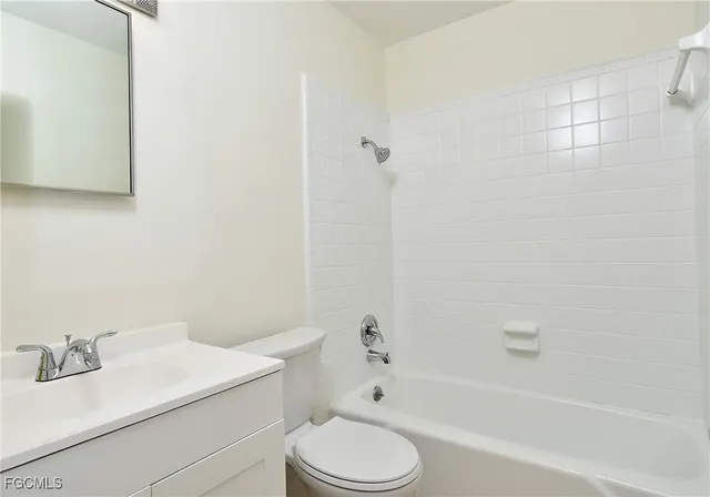 a bathroom with a sink toilet and bathtub