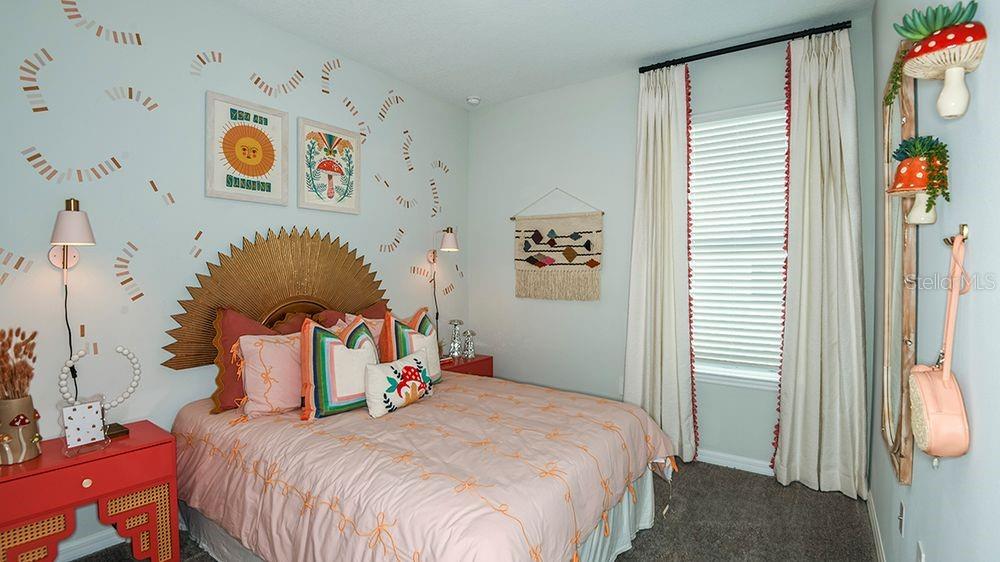 32488 Sea Loch Loop Mount Dora, FL 32757 - Photo 17 of 31 a bedroom with a bed and a window