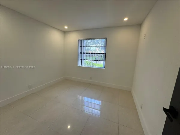 a view of hallway with stairs