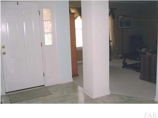 6010 Ridgeview Drive Milton, FL 32570 - Photo 3 of 12 FOYER LOOKING INTO LIVING ROOM