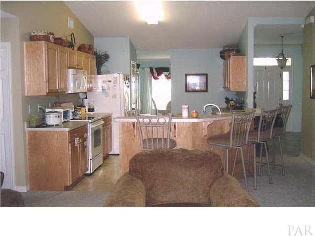 6010 Ridgeview Drive Milton, FL 32570 - Photo 8 of 12 KITCHEN FROM GREATROOM