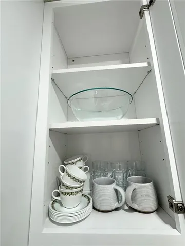a close view of table and chairs in living room
