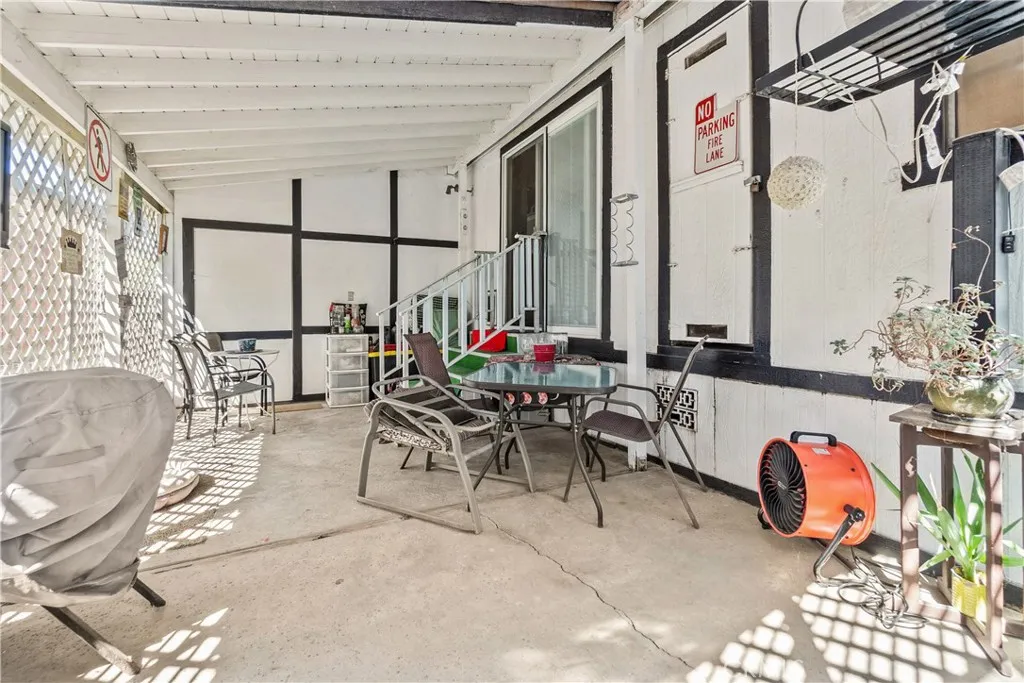 1550 Rimpau, Unit 185 Corona, CA 92881 - Photo 12 of 41 EXTERIOR COVERED PATIO