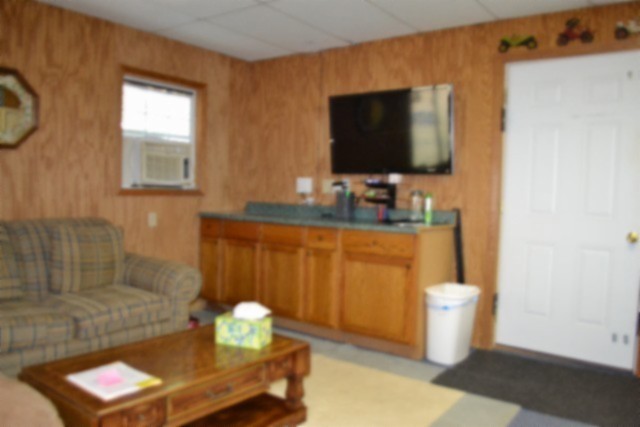 318 Rock Springs Road Celina, TN 38551 - Photo 10 of 87 a living room with furniture and a flat screen tv