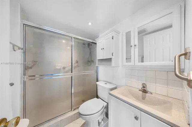 a swimming pool with outdoor seating