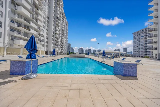 a swimming pool with outdoor space